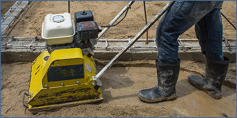 Figure 1 - Plate compactor in use on residential site