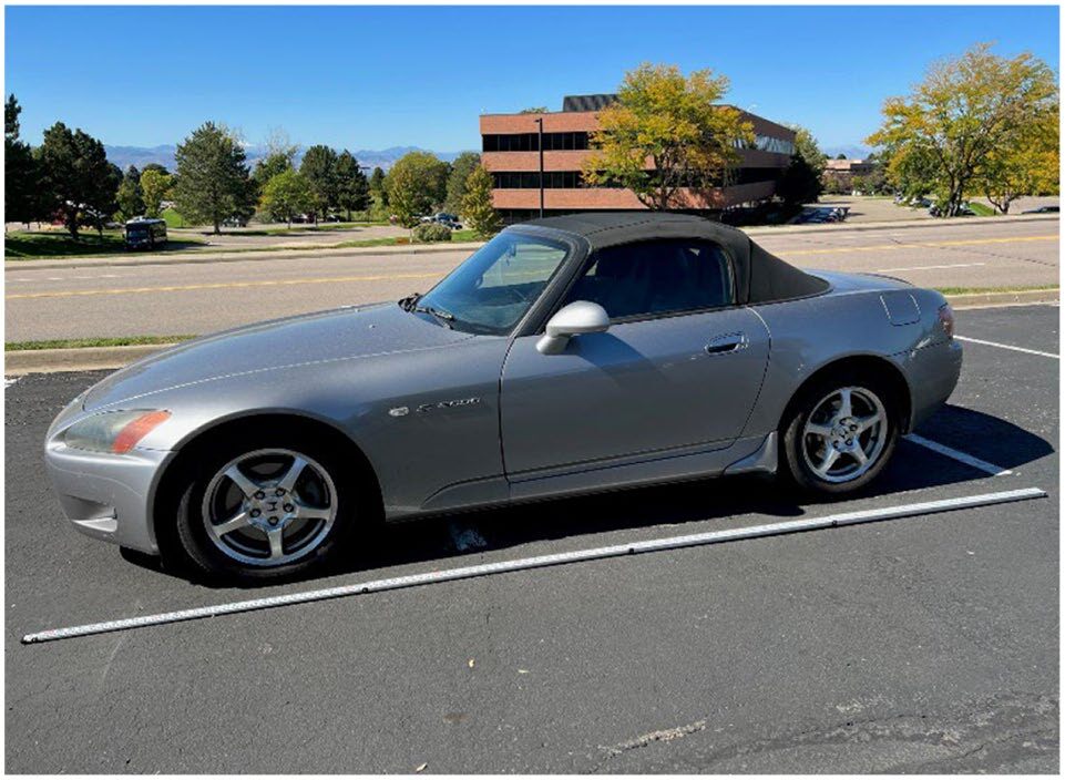 Figure 4 - An image of the 13-foot scale placed next to the Honda S2000.